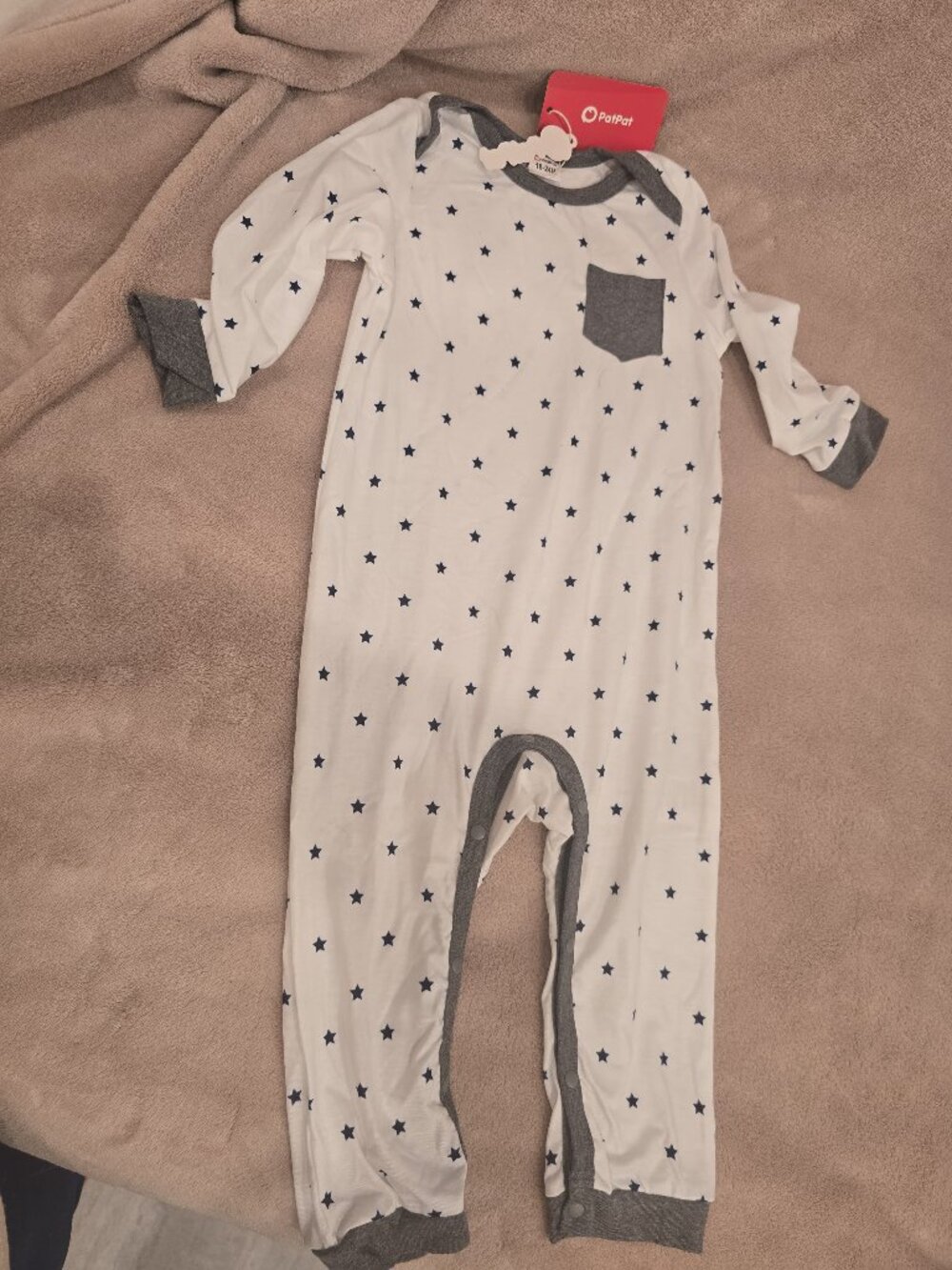 White Baby Romper with an Allover Navy Star Print